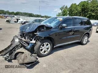 2012 Dodge Durango Crew with VIN 1C4RDJDG9CC191381, listed as a Copart auction lot 70437465 with 142,644 mi miles and Salvage title. Bid and sale history available at DreamBid. Image 1.