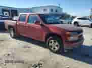 2011 Chevrolet Colorado 1LT with VIN 1GCDSCFE9B8127933, listed as a Copart auction lot 82834244 with 107,048 mi miles and Salvage title. Bid and sale history available at DreamBid. Image 4.