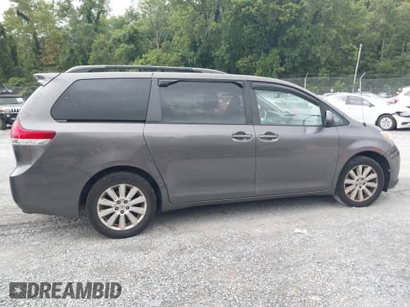 2012 Toyota Sienna LE with VIN 5TDJK3DC1CS035944, listed as a IAAI auction lot 42964470 with 209,634 mi miles and . Bid and sale history available at DreamBid. Image 13.