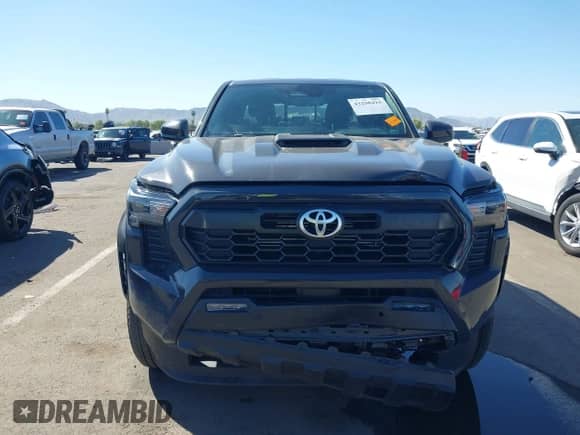 2024 Toyota Tacoma SR5 with VIN 3TMLB5FN8RM005075, listed as a IAAI auction lot 43290415 with 20,318 mi miles and . Bid and sale history available at DreamBid. Image 12.