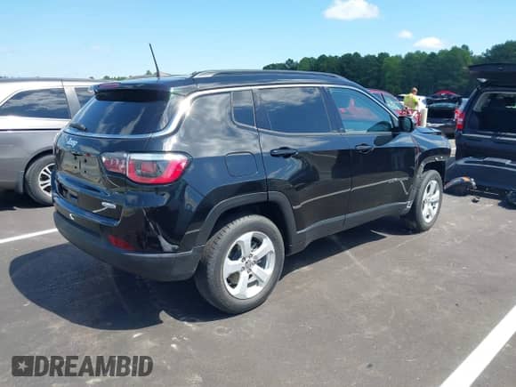 2018 Jeep Compass Latitude with VIN 3C4NJDBB7JT349315, listed as a IAAI auction lot 43213996 with 65,357 mi miles and . Bid and sale history available at DreamBid. Image 4.