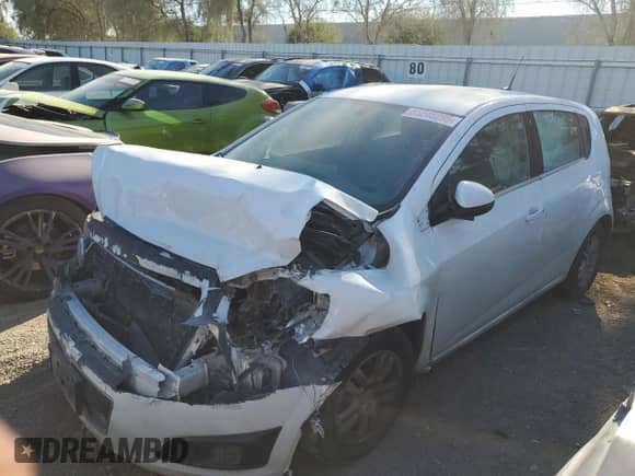 2014 Chevrolet Sonic LT с VIN 1G1JC6SH1E4227675, выставлен на аукционе Copart как лот 68245295 с пробегом Не указан миль и Списание • Salvage title. История ставок и продаж доступна на DreamBid. Изображение 1.