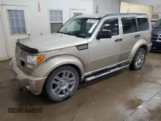 2010 Dodge Nitro with VIN 1D4PU5GXXAW169477, listed as a Copart auction lot 66279595 with 150,019 mi miles and Clean title. Bid and sale history available at DreamBid. Image 1.