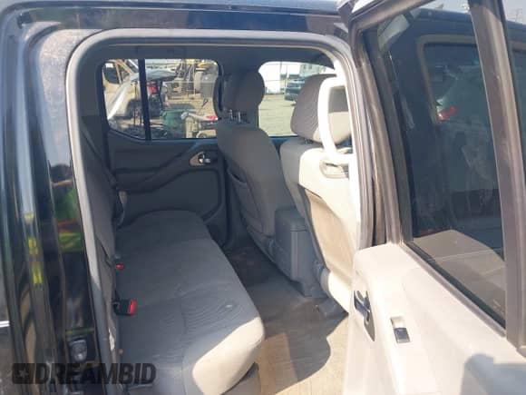 2009 Nissan Frontier SE with VIN 1N6AD09W89C411686, listed as a IAAI auction lot 43144770 with 197,794 mi miles and . Bid and sale history available at DreamBid. Image 8.