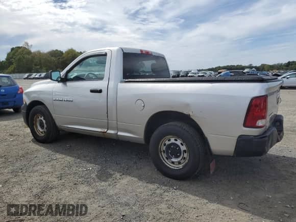 2012 Ram 1500 ST with VIN 3C6JD6AK1CG185842, listed as a Copart auction lot 80997775 with 123,516 mi miles and Clean title. Bid and sale history available at DreamBid. Image 2.