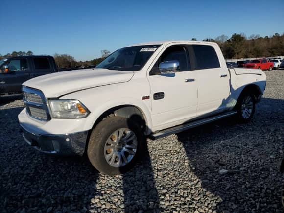 2015 Ram 1500 Laramie Longhorn with VIN 1C6RR7PT7FS699461, listed as a Copart auction lot 89176015 with 162,805 mi miles and Salvage title. Bid and sale history available at DreamBid. Image 1.
