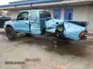 1997 Toyota Tacoma z VIN 4TAWM72NXVZ296658, wystawiony jako Copart lot #78831984 z przebiegiem 228 827 mil mil oraz Szkoda całkowita • Salvage title. Historia ofert i sprzedaży dostępna na DreamBid. Obrazek 2.
