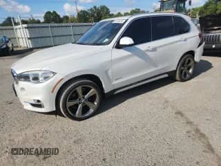 2017 BMW X5 xDrive35i with VIN 5UXKR0C37H0V71127, listed as a Copart auction lot 85703435 with 126,880 mi miles and Salvage title. Bid and sale history available at DreamBid. Image 1.