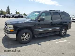 2002 Chevrolet Tahoe LS with VIN 1GNEC13T52R290024, listed as a Copart auction lot 65583635 with 154,333 mi miles and Salvage title. Bid and sale history available at DreamBid. Image 1.