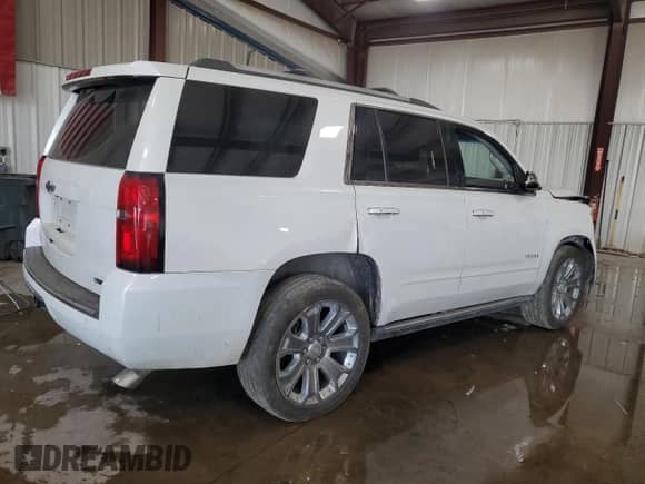 2017 Chevrolet Tahoe Premier z VIN 1GNSKCKC7HR140749, wystawiony jako Copart lot #70206795 z przebiegiem 132 107 mil mil oraz Szkoda całkowita • Salvage title. Historia ofert i sprzedaży dostępna na DreamBid. Obrazek 3.