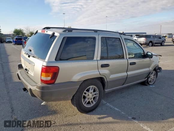 2004 Jeep Grand Cherokee Laredo with VIN 1J4GX48S94C313442, listed as a Copart auction lot 86679925 with 52,727 mi miles and Salvage title. Bid and sale history available at DreamBid. Image 3.