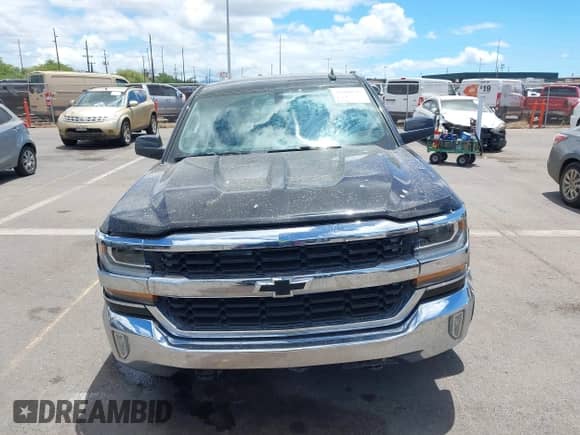 2017 Chevrolet Silverado 1500 LT with VIN 3GCPCREC9HG239048, listed as a IAAI auction lot 42988747 with 141,289 mi miles and . Bid and sale history available at DreamBid. Image 12.