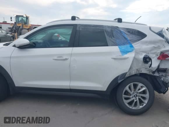 2016 Hyundai Tucson Sport with VIN KM8J33A22GU242249, listed as a IAAI auction lot 43444641 with 117,553 mi miles and . Bid and sale history available at DreamBid. Image 14.