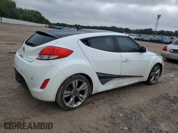 2013 Hyundai Veloster w/Black Int z VIN KMHTC6AD6DU145921, wystawiony jako Copart lot #68556835 z przebiegiem 91 117 mil mil oraz Szkoda całkowita • Salvage title. Historia ofert i sprzedaży dostępna na DreamBid. Obrazek 3.