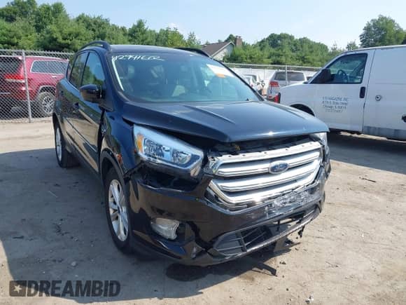 2018 Ford Escape SE with VIN 1FMCU9GD8JUC47268, listed as a IAAI auction lot 42941602 with 87,617 mi miles and . Bid and sale history available at DreamBid. Image 6.