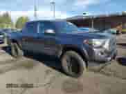 2023 Toyota Tacoma SR with VIN 3TMCZ5ANXPM559511, listed as a Copart auction lot 80508385 with 33,176 mi miles and Salvage title. Bid and sale history available at DreamBid. Image 4.