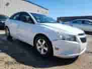 2011 Chevrolet Cruze 1FL z VIN 1G1PE5S90B7235736, wystawiony jako Copart lot #70587245 z przebiegiem 185 810 mil mil oraz Szkoda całkowita • Salvage title. Historia ofert i sprzedaży dostępna na DreamBid. Obrazek 4.