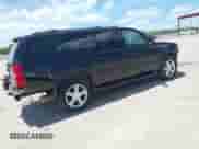 2013 Chevrolet Suburban LT with VIN 1GNSKJE71DR168382, listed as a IAAI auction lot 42821206 with 209,210 mi miles and . Bid and sale history available at DreamBid. Image 4.