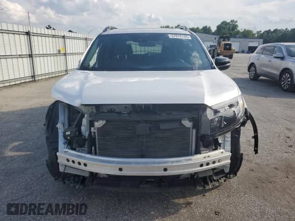 2023 Honda Passport Elite with VIN 5FNYF8H09PB007934, listed as a Copart auction lot 57076135 with 50,650 mi miles and Salvage title. Bid and sale history available at DreamBid. Image 5.