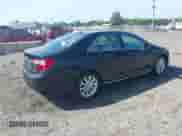 2013 Toyota Camry LE z VIN 4T1BD1FK1DU071049, wystawiony jako IAAI lot #42832003 z przebiegiem 156 477 mil mil oraz . Historia ofert i sprzedaży dostępna na DreamBid. Obrazek 4.