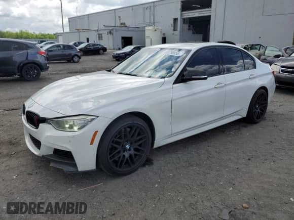 2015 BMW 3 Series 335i xDrive with VIN WBA3B9C51FP982847, listed as a Copart auction lot 63790055 with 141,778 mi miles and Salvage title. Bid and sale history available at DreamBid. Image 1.