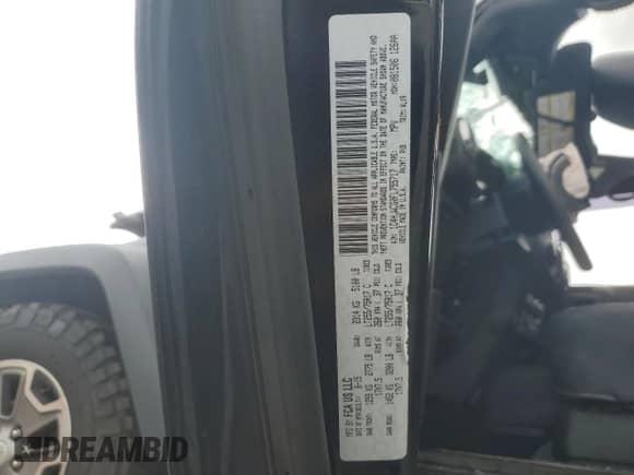 2015 Jeep Wrangler Rubicon z VIN 1C4HJWCG0FL755717, wystawiony jako Copart lot #61375435 z przebiegiem 153 207 mil mil oraz Szkoda całkowita • Salvage title. Historia ofert i sprzedaży dostępna na DreamBid. Obrazek 14.