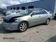 2005 Toyota Camry LE с VIN 4T1BF32KX5U596821, выставлен на аукционе Copart как лот 87047295 с пробегом 169 634 миль миль и Списание • Salvage title. История ставок и продаж доступна на DreamBid. Изображение 1.
