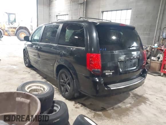 2012 Dodge Grand Caravan Crew with VIN 2C4RDGDG3CR359882, listed as a IAAI auction lot 43499308 with 157,986 mi miles and . Bid and sale history available at DreamBid. Image 3.