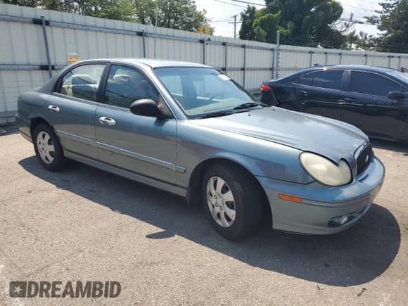 2004 Hyundai Sonata z VIN KMHWF25H14A085736, wystawiony jako Copart lot #60663805 z przebiegiem 181 698 mil mil oraz Szkoda całkowita • Salvage title. Historia ofert i sprzedaży dostępna na DreamBid. Obrazek 4.