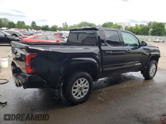 2024 Toyota Tacoma SR5 with VIN 3TYLB5JN2RT020098, listed as a Copart auction lot 63778995 with 9,100 mi miles and Salvage title. Bid and sale history available at DreamBid. Image 3.