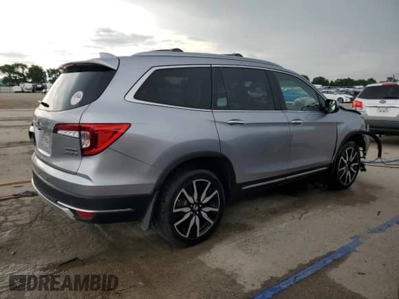 2022 Honda Pilot Touring 7-Passenger z VIN 5FNYF6H61NB019565, wystawiony jako Copart lot #61307035 z przebiegiem 75 932 mil mil oraz Szkoda całkowita • Salvage title. Historia ofert i sprzedaży dostępna na DreamBid. Obrazek 3.