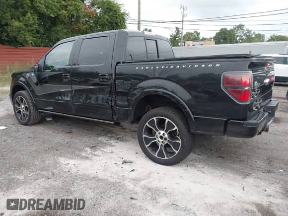 2012 Ford F-150 Lariat with VIN 1FTFW1E69CFC01344, listed as a IAAI auction lot 42828391 with 141,966 mi miles and . Bid and sale history available at DreamBid. Image 3.