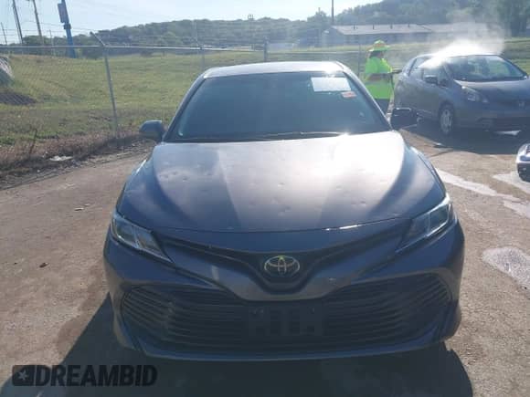 2020 Toyota Camry LE with VIN 4T1C11AK9LU391108, listed as a IAAI auction lot 43087805 with 88,386 mi miles and . Bid and sale history available at DreamBid. Image 12.