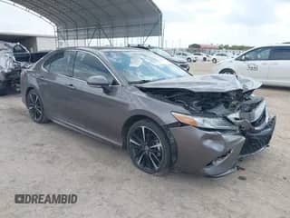 2020 Toyota Camry XSE with VIN 4T1K61AK8LU986917, listed as a IAAI auction lot 43093102 with 50,424 mi miles and . Bid and sale history available at DreamBid. Image 1.