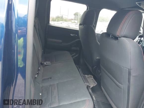 2023 Nissan Frontier SV with VIN 1N6ED1EK2PN621809, listed as a IAAI auction lot 42791265 with 11,305 mi miles and . Bid and sale history available at DreamBid. Image 8.