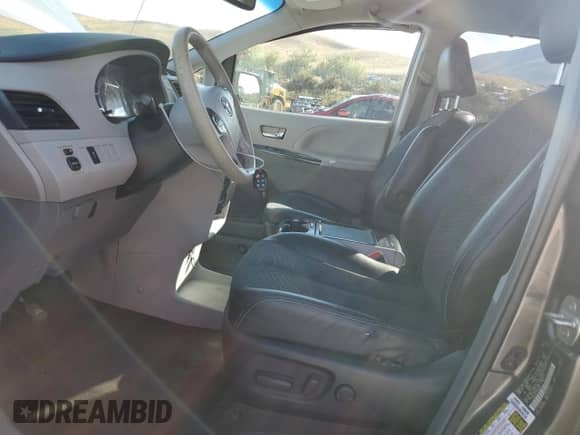 2013 Toyota Sienna SE with VIN 5TDXK3DC1DS298897, listed as a Copart auction lot 71516545 with 177,991 mi miles and Salvage title. Bid and sale history available at DreamBid. Image 7.