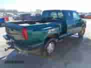 1997 Chevrolet Silverado 1500 with VIN 2GCEK19RXV1115899, listed as a IAAI auction lot 41671682 with 291,289 mi miles and . Bid and sale history available at DreamBid. Image 4.