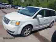2009 Dodge Grand Caravan SXT with VIN 2D8HN54159R626944, listed as a IAAI auction lot 43056559 with 220,711 mi miles and . Bid and sale history available at DreamBid. Image 2.