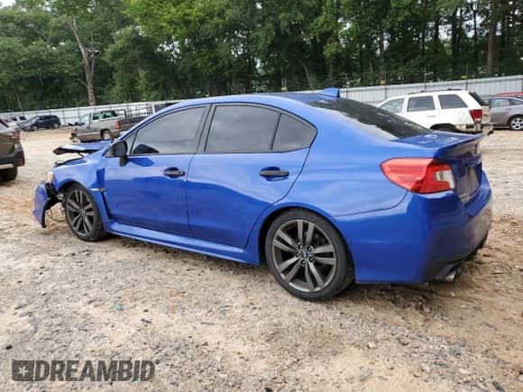 2017 Subaru WRX Premium with VIN JF1VA1E67H9826315, listed as a Copart auction lot 67743515 with 105,913 mi miles and Salvage title. Bid and sale history available at DreamBid. Image 2.
