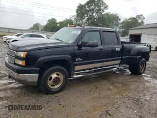 2005 Chevrolet Silverado 3500 DRW LT with VIN 1GCJK33255F877214, listed as a Copart auction lot 58512565 with 136,409 mi miles and Salvage title. Bid and sale history available at DreamBid. Image 1.