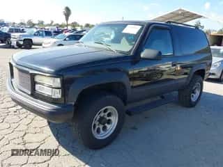 1999 Chevrolet Tahoe z VIN 3GNEK18R2XG111641, wystawiony jako IAAI lot #43306014 z przebiegiem 175 885 mil mil oraz . Historia ofert i sprzedaży dostępna na DreamBid. Obrazek 2.