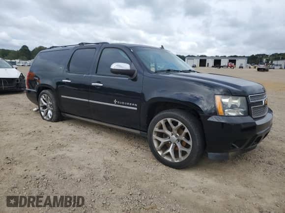 2014 Chevrolet Suburban LTZ с VIN 1GNSKKE7XER239070, выставлен на аукционе Copart как лот 85556165 с пробегом 186 343 миль миль и Чистый • Clean title. История ставок и продаж доступна на DreamBid. Изображение 4.