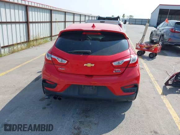 2018 Chevrolet Cruze Premier z VIN 3G1BF6SM9JS534983, wystawiony jako IAAI lot #40311915 z przebiegiem Nie podano mil oraz . Historia ofert i sprzedaży dostępna na DreamBid. Obrazek 16.
