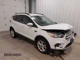 2018 Ford Escape SE with VIN 1FMCU9GD6JUC77191, listed as a IAAI auction lot 42298565 with 68,806 mi miles and . Bid and sale history available at DreamBid. Image 1.
