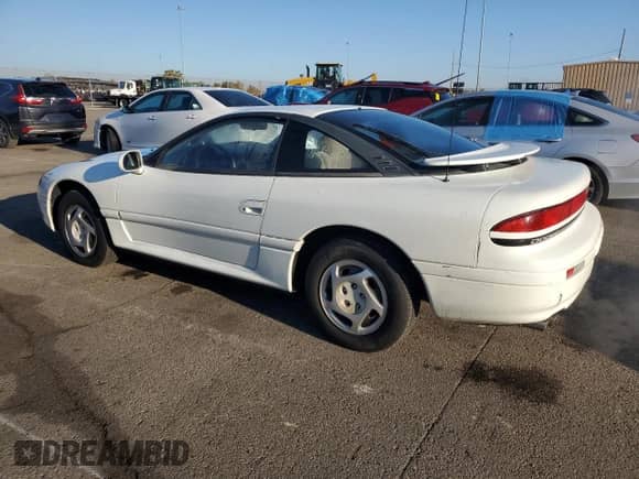 1994 Dodge Stealth with VIN JB3AM44H1RY006874, listed as a Copart auction lot 75991164 with 59,310 mi miles and Salvage title. Bid and sale history available at DreamBid. Image 2.