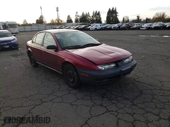 1999 Saturn SL with VIN 1G8ZH5286XZ192072, listed as a Copart auction lot 80973254 with 254,855 mi miles and Salvage title. Bid and sale history available at DreamBid. Image 11.