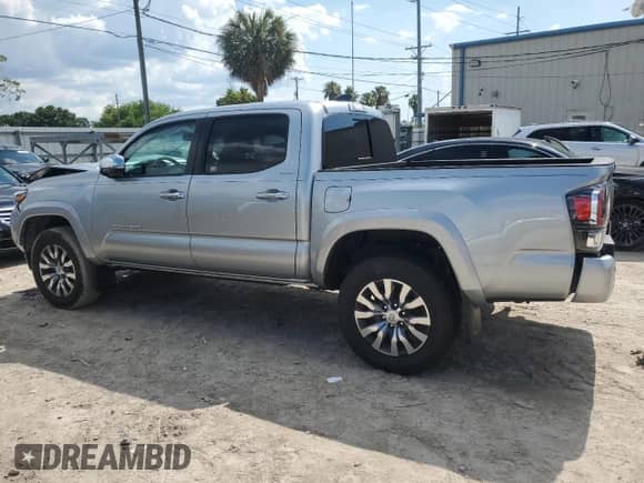 2023 Toyota Tacoma Limited с VIN 3TMEZ5CN5PM198548, выставлен на аукционе Copart как лот 59275244 с пробегом 27 057 миль миль и На запчасти • Non repairable. История ставок и продаж доступна на DreamBid. Изображение 2.