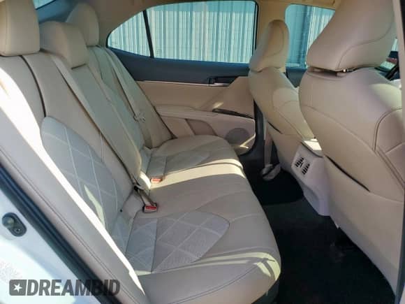 2019 Toyota Camry Hybrid LE с VIN 4T1B21HK2KU512025, выставлен на аукционе Copart как лот 80734415 с пробегом 106 463 миль миль и Списание • Salvage title. История ставок и продаж доступна на DreamBid. Изображение 10.