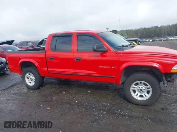 2002 Dodge Dakota SLT with VIN 1B7HG48N72S564130, listed as a IAAI auction lot 41561697 with 188,946 mi miles and . Bid and sale history available at DreamBid. Image 14.