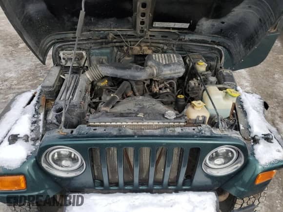 2000 Jeep Wrangler SE с VIN 1J4FA29P7YP788923, выставлен на аукционе Copart как лот 45281235 с пробегом 153 691 миль миль и Списание • Salvage title. История ставок и продаж доступна на DreamBid. Изображение 12.